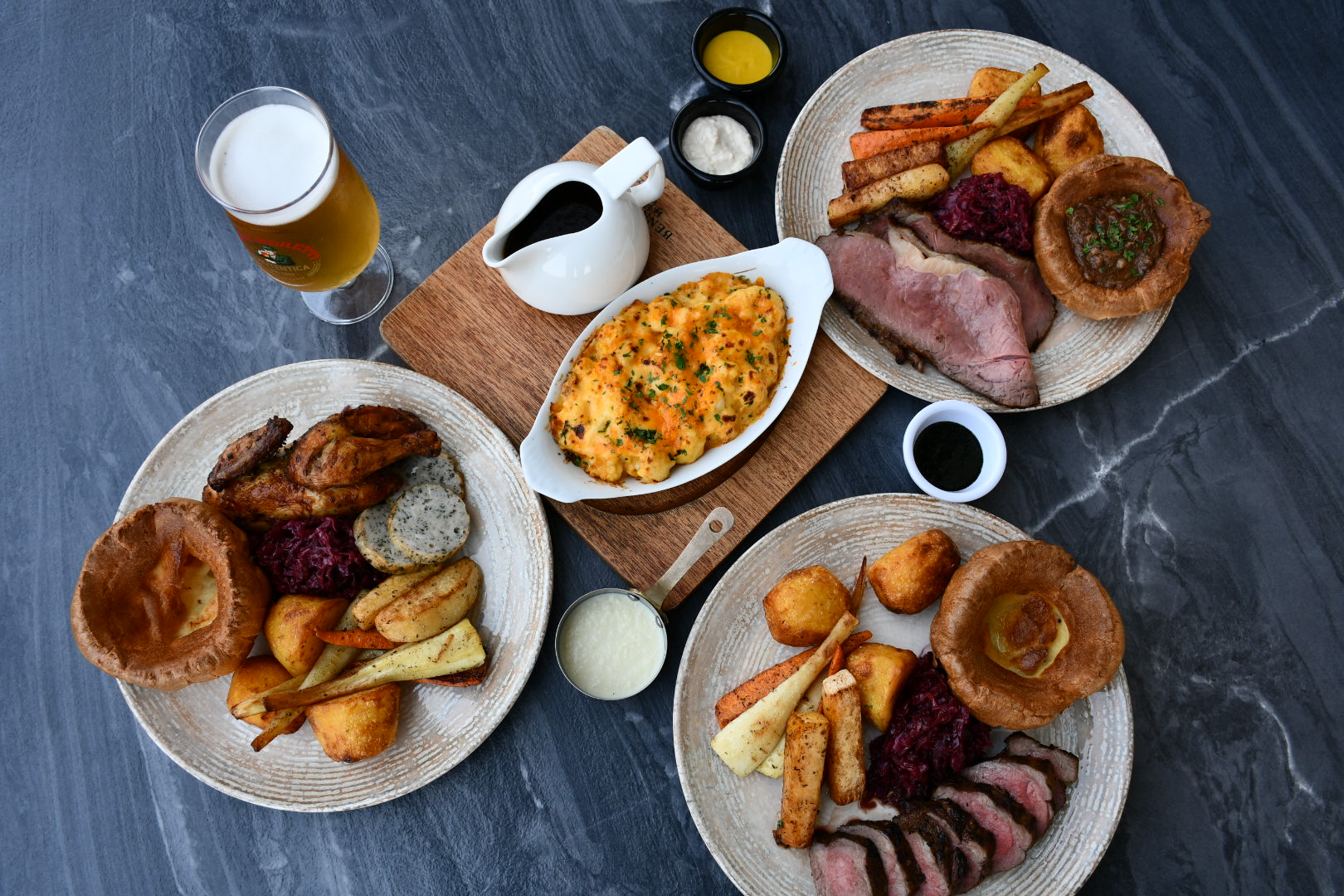 Sunday roast plates with Yorkshire puddings and all the trimmings at Benny Mack's